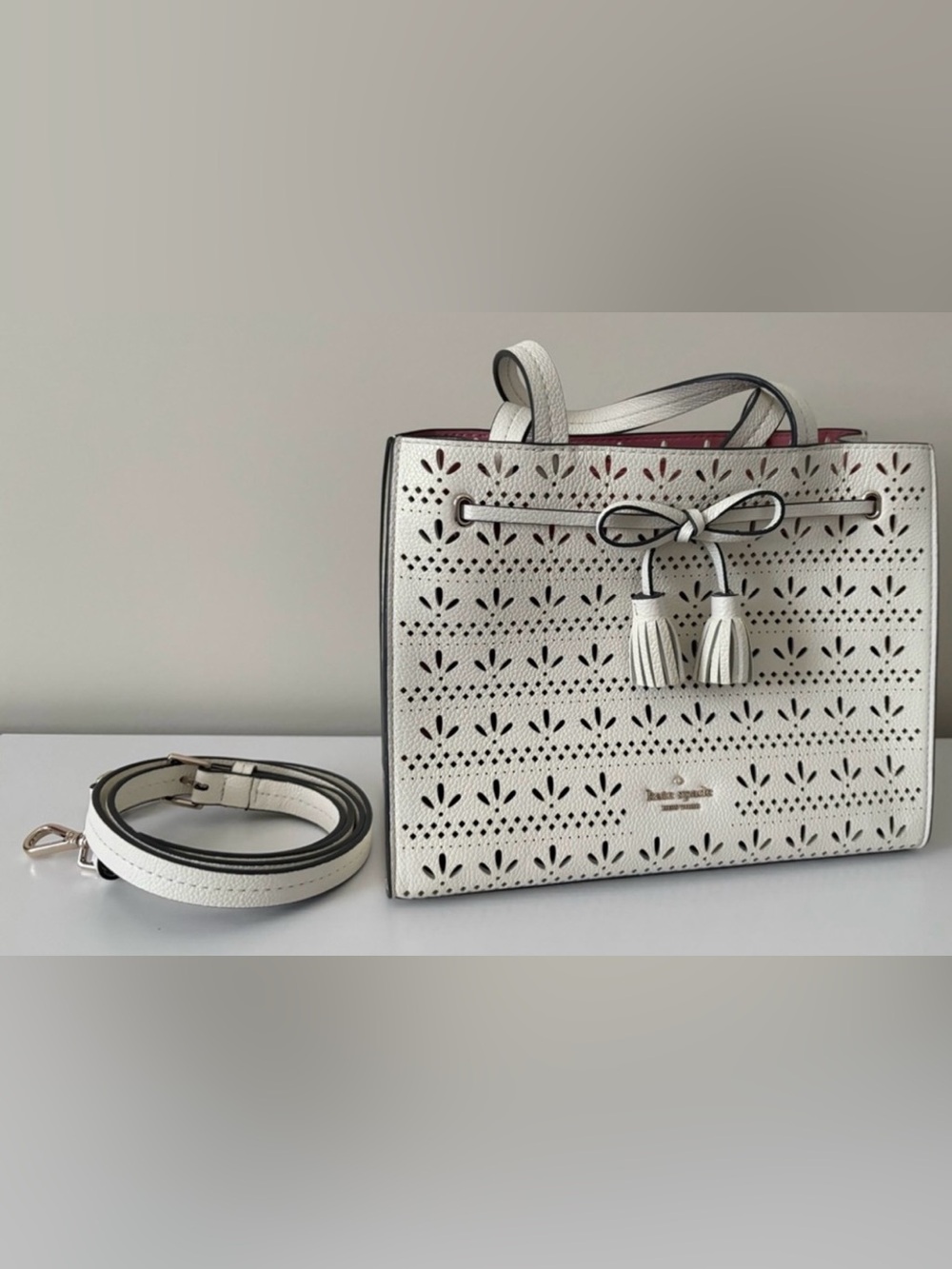 kate spade White Perforated Leather Tote with Tassel Bow